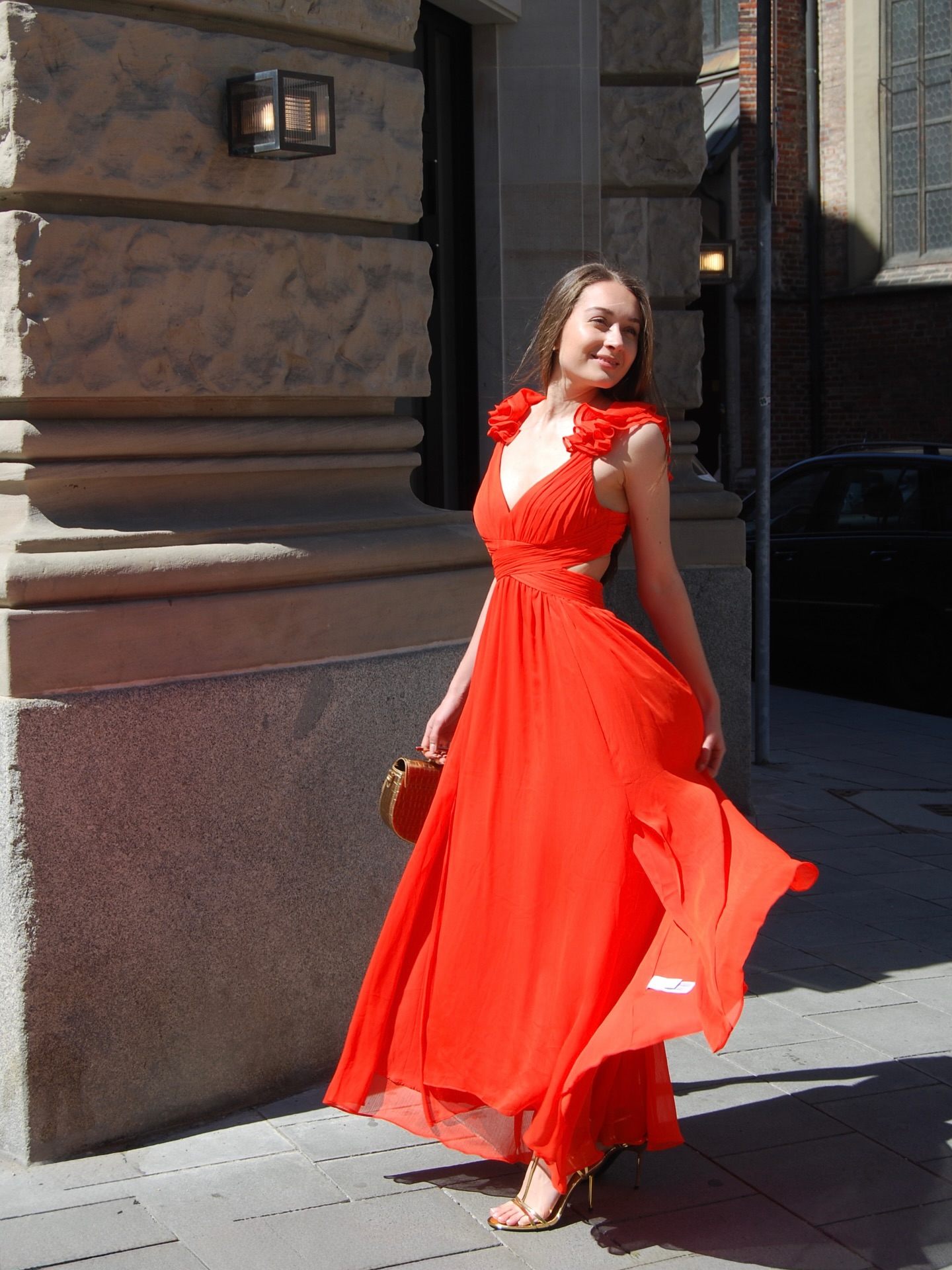 Why a Bright Red Gown Can Feel So Powerful in Daylight