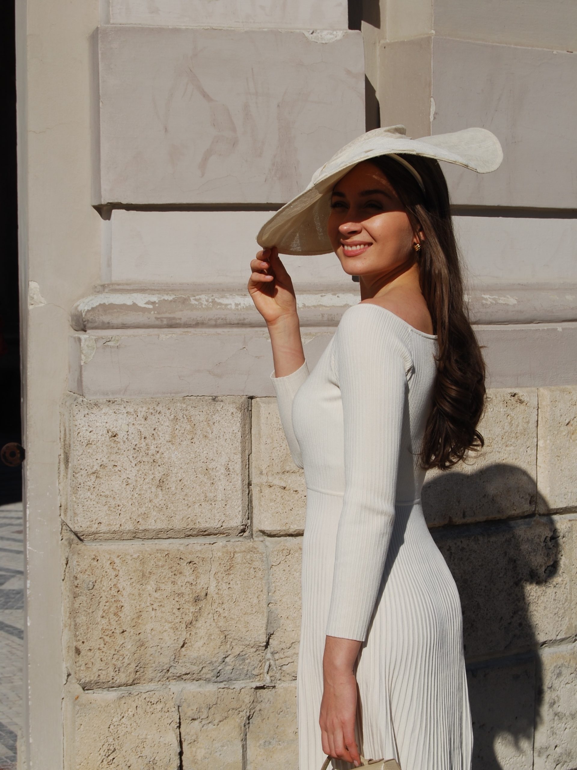 An Ivory Knit Dress and Structured Hat That Feel Made for a Summer Occasion